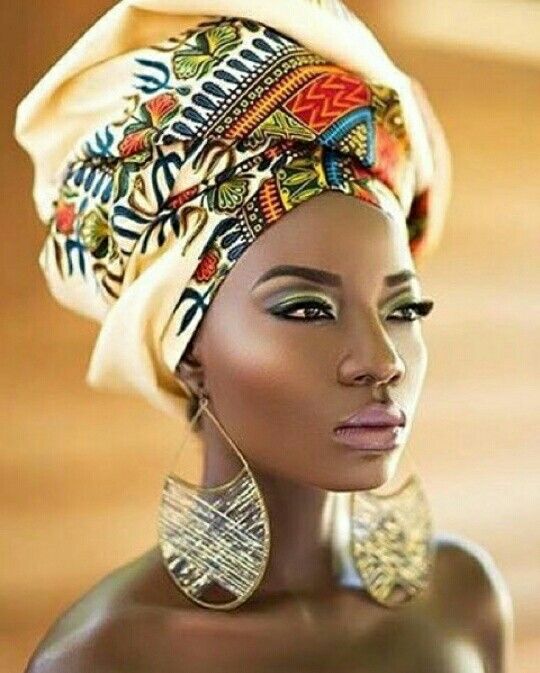 lady rocks African head gear and gorgeous earrings