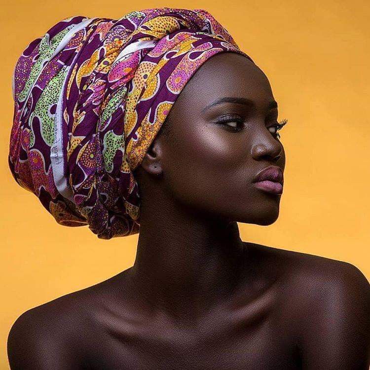 ebony lady rocks African head gear