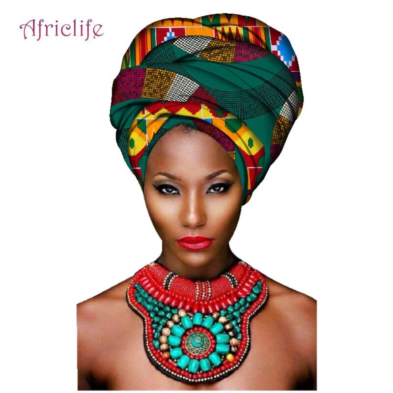 lady rocks African head gear and bracelet