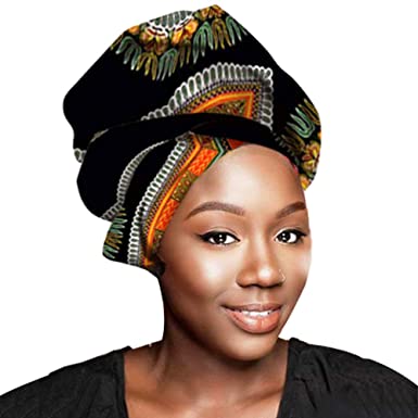 lady rocks African head gear and dark top